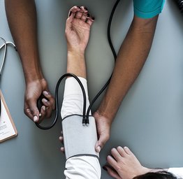 person taking blood pressure